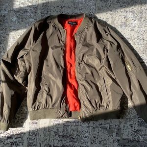 Army green and orange bomber jacket
